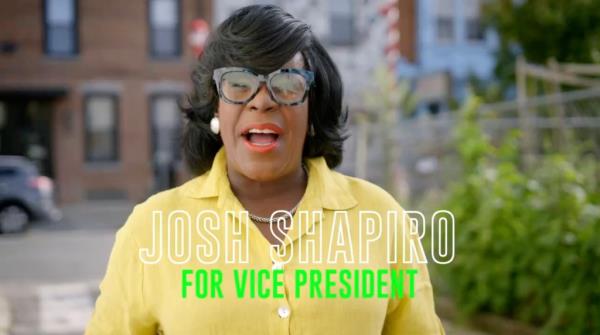 Philadelphia Mayor Cherelle Parker with glasses and wearing a yellow shirt releasing an ad supporting Kamala Harris