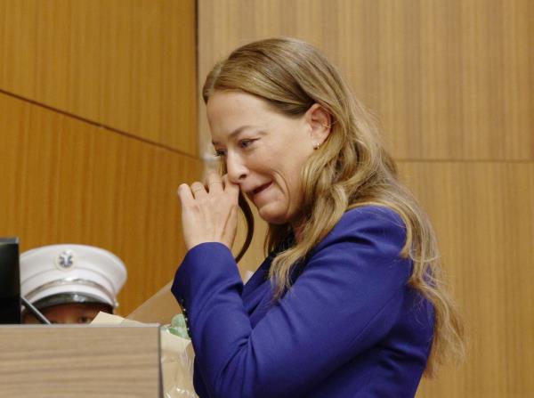 An emotio<em></em>nal FDNY Commissio<em></em>ner Laura Kavanagh wipes away a tear.