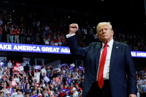 Republican presidential nominee, former U.S. President Do<em></em>nald Trump walks offstage after  speaking at a campaign rally at the Van Andel Arena on July 20, 2024 in Grand Rapids, Michigan.