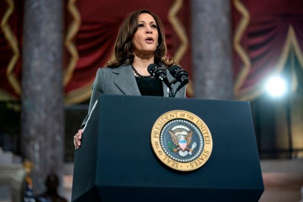 President Joe Biden and Vice President Kamala Harris cross paths as they deliver respective remarks to mark the one-year anniversary of the January 6th Capitol insurrection in Statuary Hall on Capitol Hill on January 6, 2022 in Washington, DC.