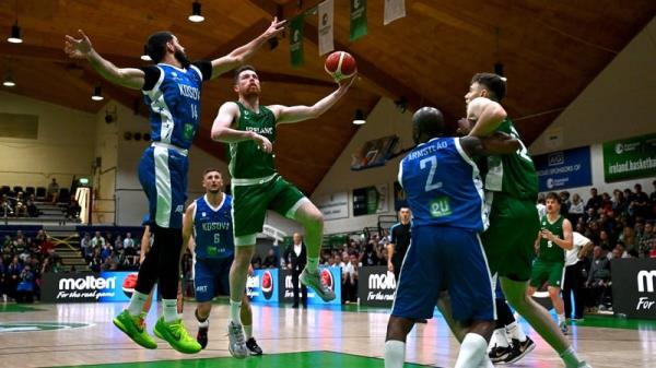 Jordan Blount rising for a lay-up attempt against Kosovo